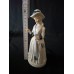 Figurine "Lady in a Hat with an Umbrella"