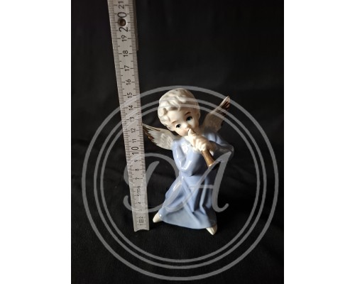 Vintage Porcelain Figurine of a Kneeling Angel Playing a Musical Instrument