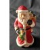 Vintage Ceramic Santa Claus Figurine. This is a hand-painted decorative item.