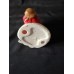 Vintage Ceramic Santa Claus Figurine. This is a hand-painted decorative item.