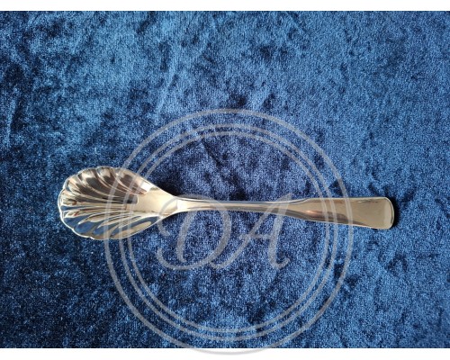 Antique sugar spoon with shell-shaped cup.