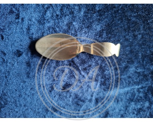 A collector's spoon with an unusually curved handle.