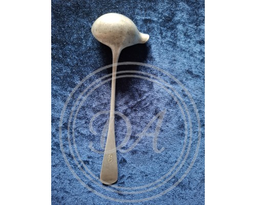 Antique metal stamp spoon.