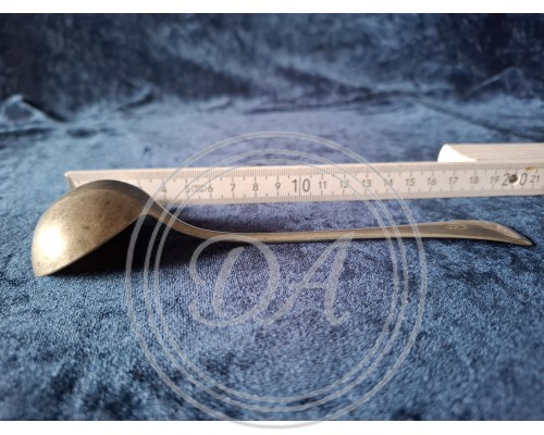 Antique metal stamp spoon.