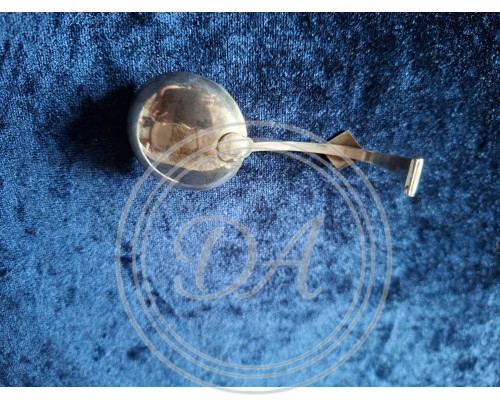 Antique silver ladle or sauce ladle.