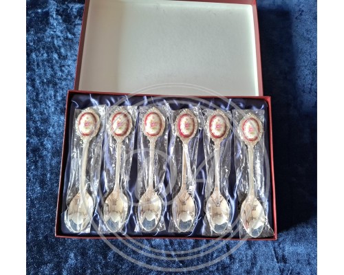 A set of 6 silver-plated teaspoons with a pink porcelain cameo flower inlay on the handle.