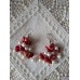 Red coral and white pearl drop earrings.