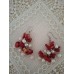 Red coral and white pearl drop earrings.