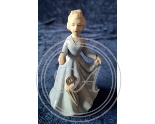 Vintage porcelain figurine "Girl with Umbrella" from Germany.