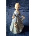 Vintage porcelain figurine "Girl with Umbrella" from Germany.