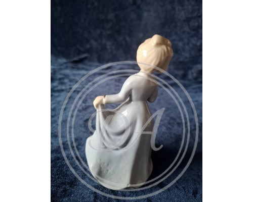 Vintage porcelain figurine "Girl with Umbrella" from Germany.