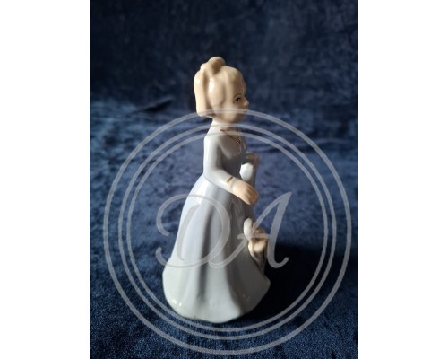 Vintage porcelain figurine "Girl with Umbrella" from Germany.