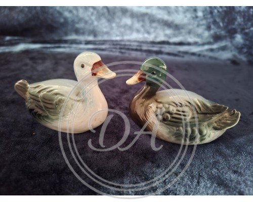 A pair of antique Royal Copley ceramic mallard figurines