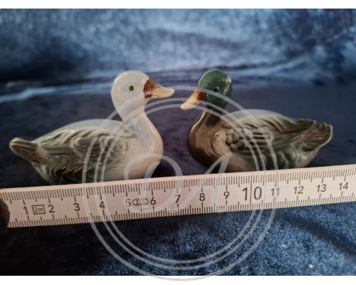 A pair of antique Royal Copley ceramic mallard figurines
