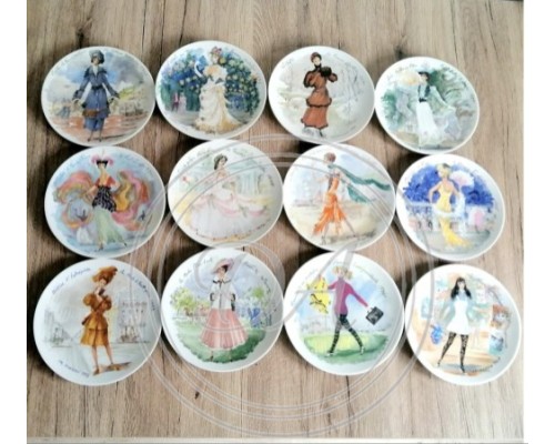 A set of 12 collector plates, “Women of the Century”, Limoges, France.