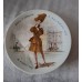 A set of 12 collector plates, “Women of the Century”, Limoges, France.