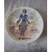 A set of 12 collector plates, “Women of the Century”, Limoges, France.