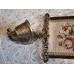 Antik Hand-made brass bell panel with a bird motif.