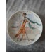 A set of 12 collector plates, “Women of the Century”, Limoges, France.