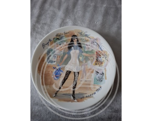 A set of 12 collector plates, “Women of the Century”, Limoges, France.