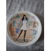 A set of 12 collector plates, “Women of the Century”, Limoges, France.