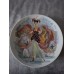 A set of 12 collector plates, “Women of the Century”, Limoges, France.