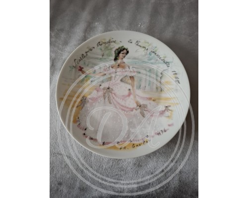 A set of 12 collector plates, “Women of the Century”, Limoges, France.
