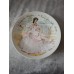 A set of 12 collector plates, “Women of the Century”, Limoges, France.