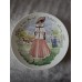A set of 12 collector plates, “Women of the Century”, Limoges, France.
