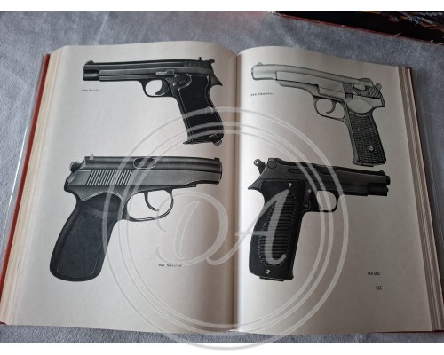 Two volumes of Yaroslav Lugs's books, "Handheld Firearms and Their History"