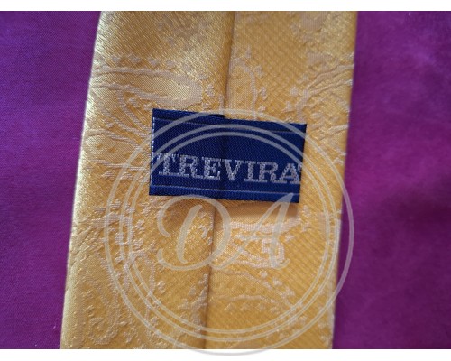 Vintage goldfarbene Trevira Krawatte aus den 70ern mit klassischem Paisley-Muster